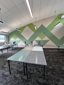 Beautiful, sustainable classrooms using 100% recycled plastic table tops.